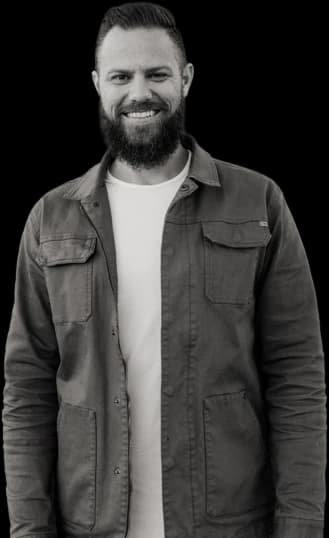 Josh Blevins, founder of WhiteSteed Digital — a black-and-white portrait.